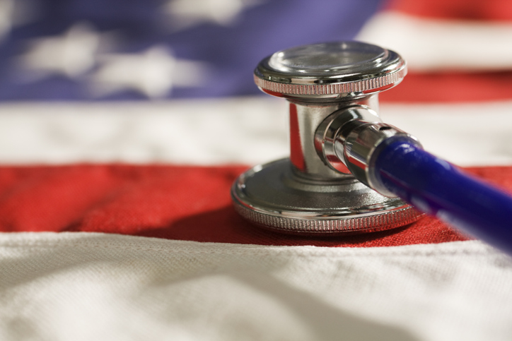 Healthcare and Medicine Political Changes Symbolized by USA Flag, Stethoscope